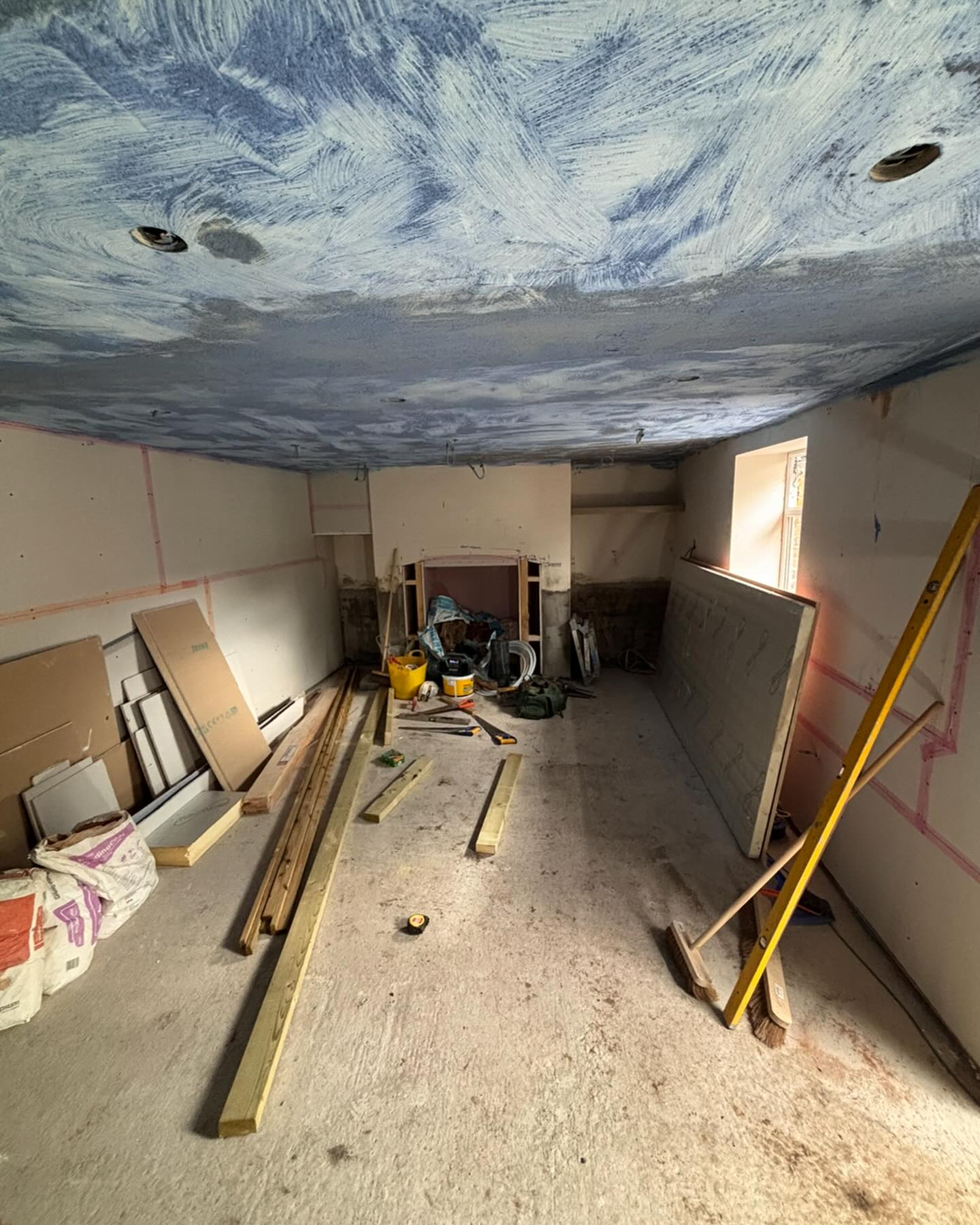 Interior room before plastering, bare walls and debris