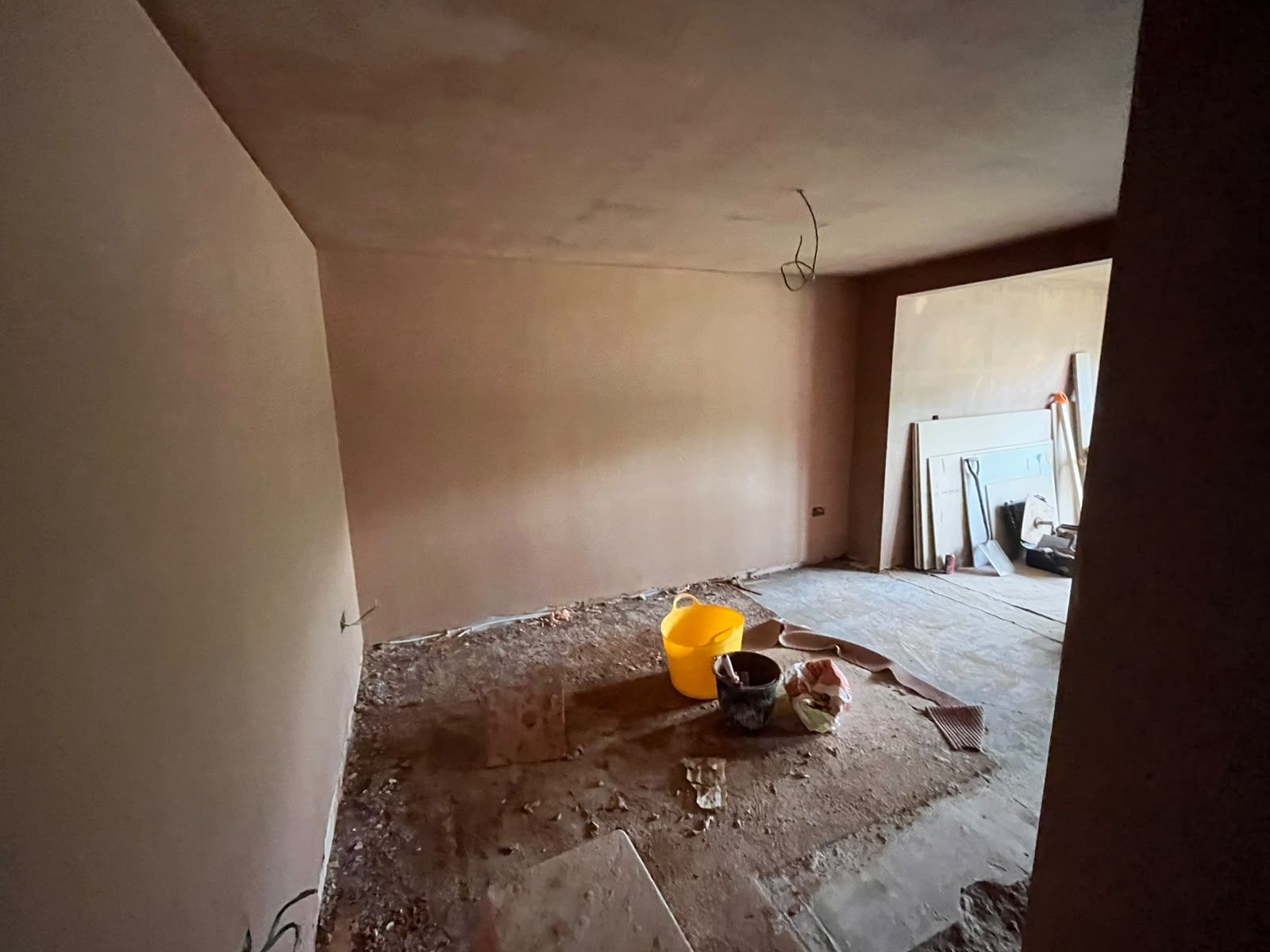 Knock-through room with walls and ceiling freshly skimmed