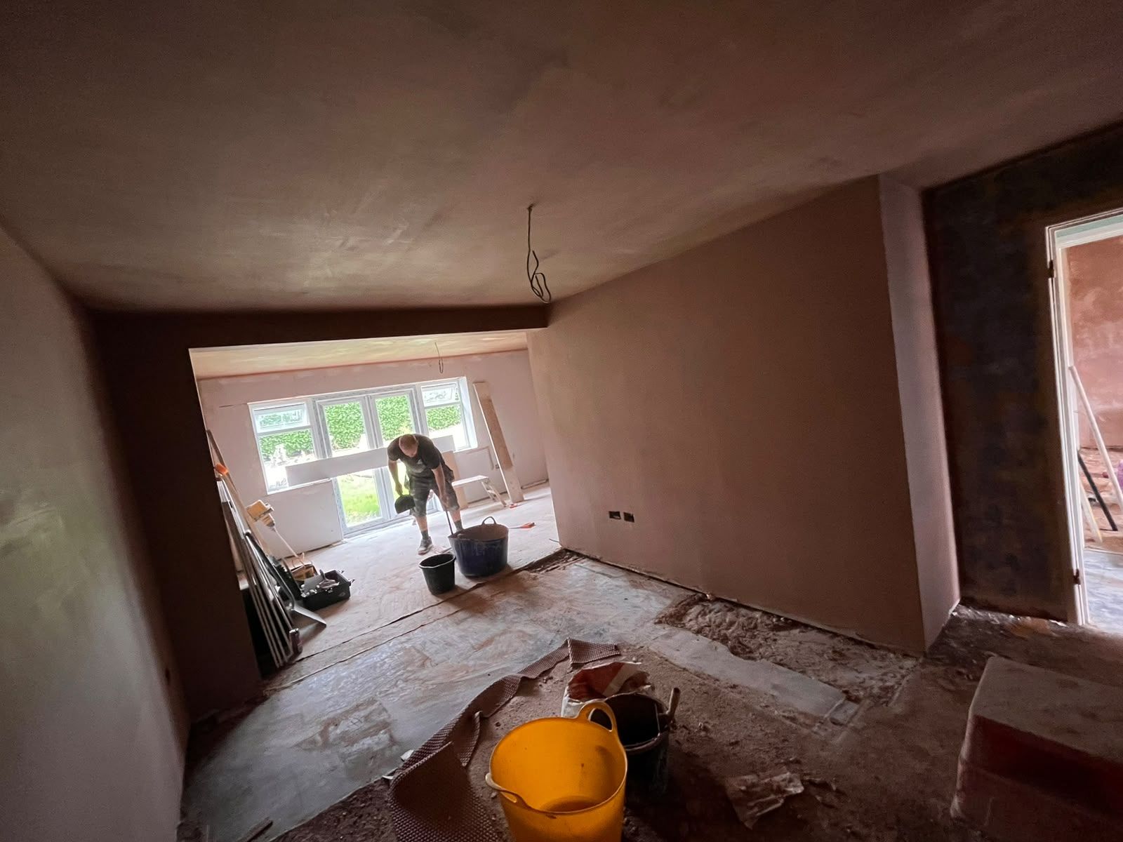 Through-lounge freshly skimmed from floor to ceiling