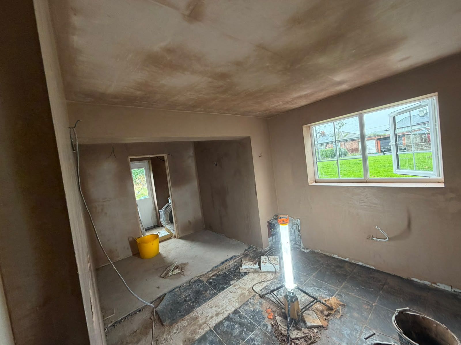 Wide extension room freshly skimmed with window to the garden