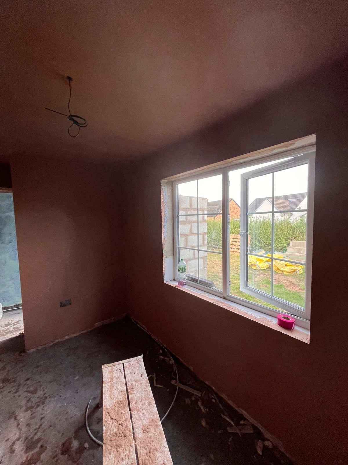 Bedroom freshly skimmed with clean window reveal