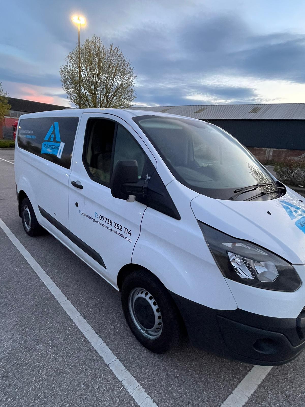 JE Plastering signwritten Ford Transit van